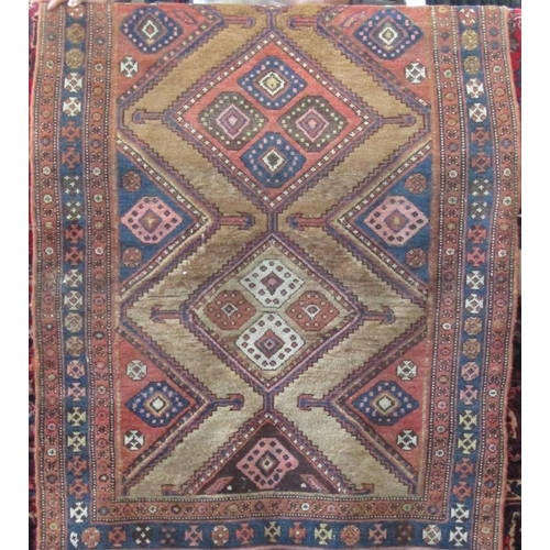 2376 - Antique Persian two medallion lori type rug, with pink, blue and washed red medallions upon a fawn g... 