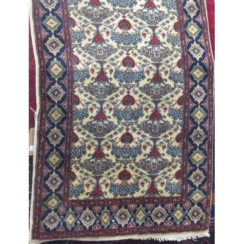 2398 - Persian tree of life type rug with geometric floral decoration upon a cream ground, 160 x 95cm