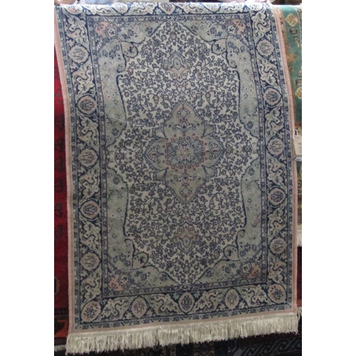 2401 - Cashmere type Persian rug with intricate scrolled medallion decoration upon a washed pink ground, 15... 