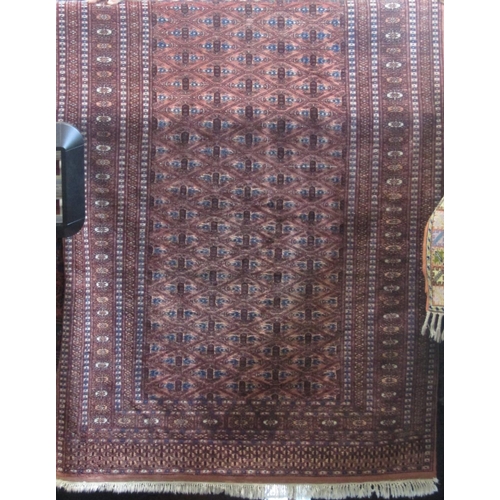 2407 - Good quality Bokhara type full pile rug with unusual repeating geometric medallion decoration upon a... 