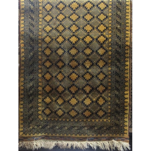 2417 - Interesting full pile Persian rug with geometric diaper decoration upon a mustard ground, 160 x 105c... 