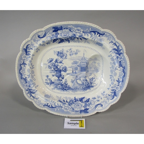 636 - A 19th century blue and white printed meat plate of oval form with well, in the Pekin Sketches patte... 