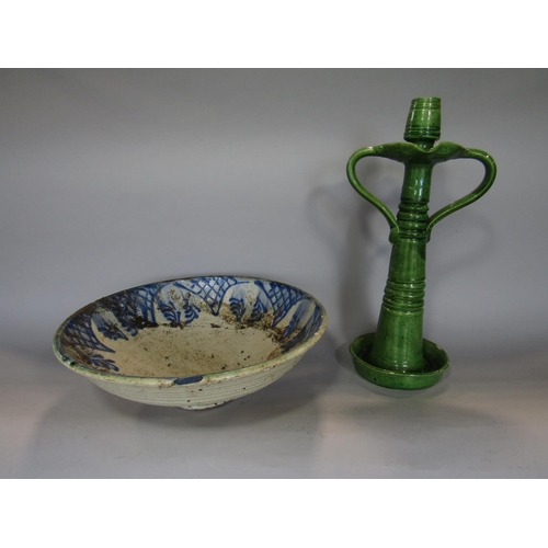 720 - A large green glazed two handled candlestick in the arts and crafts style, 39cm tall approx, togethe... 