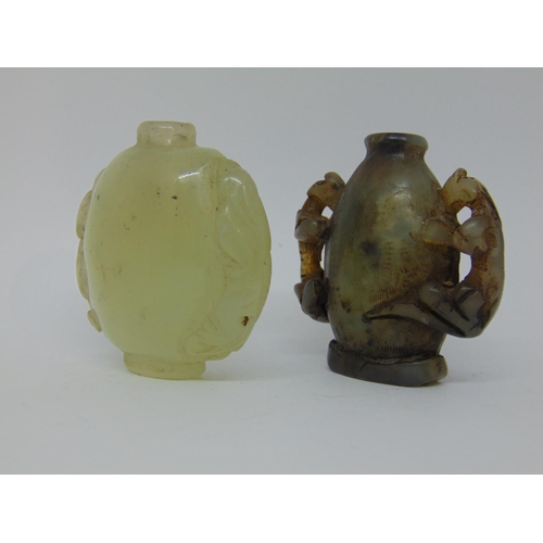 1124 - Chinese jadeite snuff bottle, another and a small carved stone panel depicting a Buddhist figure and... 