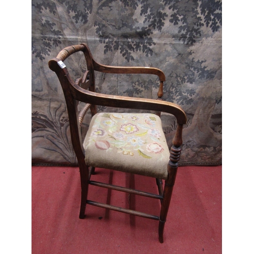2102 - A regency beechwood Countrymade elbow chair with pierced splat, further bobbin rails and hand worked... 