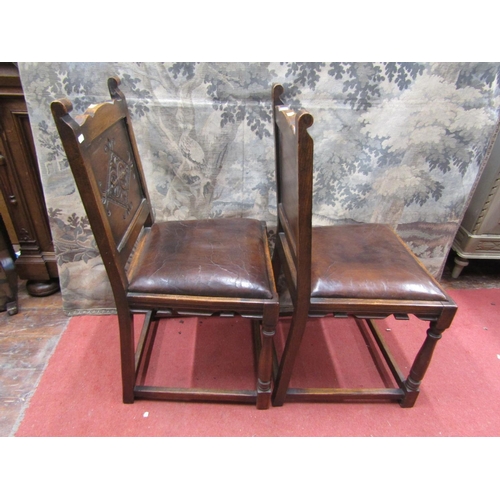 2138 - Six (4+2) oak frame dining chairs, in the Old English manner, with turned supports, hide upholstered... 