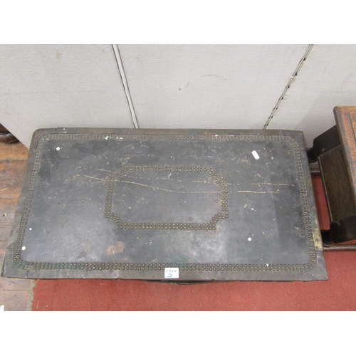 2200D - A 19th century camfor wood travelling box, overlaid in leather with silver banded borders and detail... 