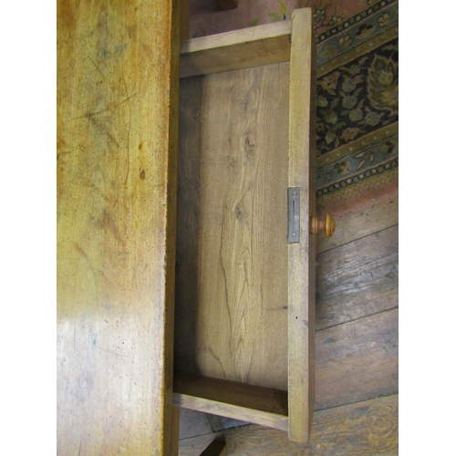 2089 - An antique fruit wood occasional table of rectangular form enclosing a single frieze drawer, 130 wid... 