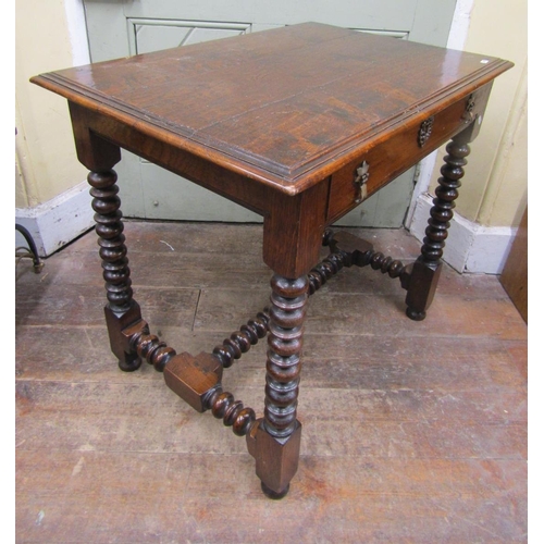 2090 - A good quality oak side table in the 17th century manner, the plank top with moulded outline over a ... 