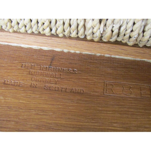 2121 - An Orkney chair - mid 20th century, in oak with straw work canopy back, makers stamp DM Kirkness of ... 
