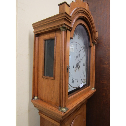 2134 - A Georgian oak Countrymade longcase clock, the arched hood enclosing broken arch painted dial with f... 