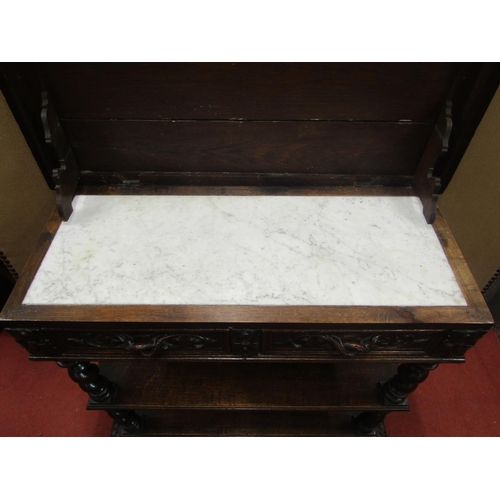 2136 - A mid Victorian period oak three tier buffet of rectangular form, with barley twist supports, enclos... 