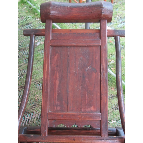 2144 - An unusual Chinese provincial star gazing chair, with extending foot rests, swept arms and reclining... 