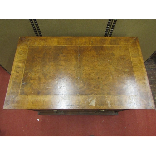 2151 - A mid-18th century style walnut and figured walnut chest of two long and two short drawers, the top ... 