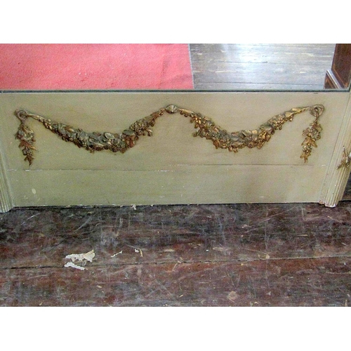 2158 - A large wall mirror of rectangular form, the reeded painted frame with gilded highlights, ribboned a... 