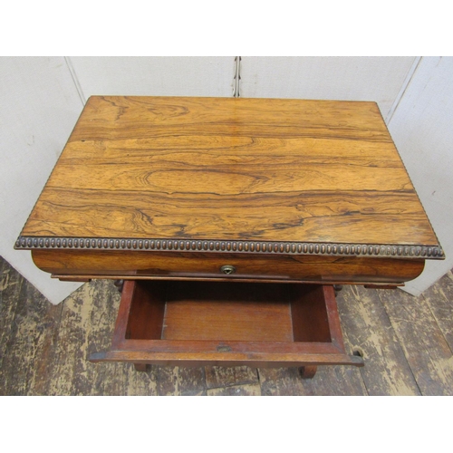 2160 - A mid-19th century rosewood ladies sewing table, the rising lid enclosing a mirro with birds eye map... 