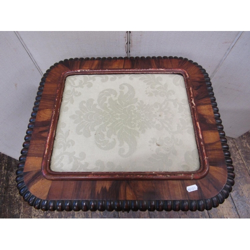 2161 - A regency rosewood centre table of square cut form, with upholstered centre, within a gadrooned bord... 