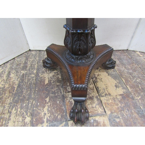 2161 - A regency rosewood centre table of square cut form, with upholstered centre, within a gadrooned bord... 