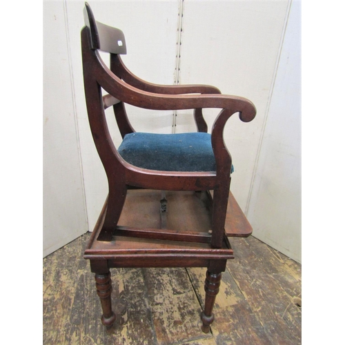 2167 - A regency mahogany child's high chair on detachable stand, with scrolled arms, upholstered seat and ... 
