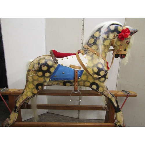 2170 - A vintage dapple grey rocking horse on central rocker, overall length 115cm x 95cm high