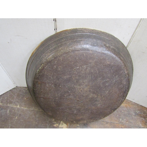 2176 - A primitive turned wood antique dairy bowl, 64cm diameter
