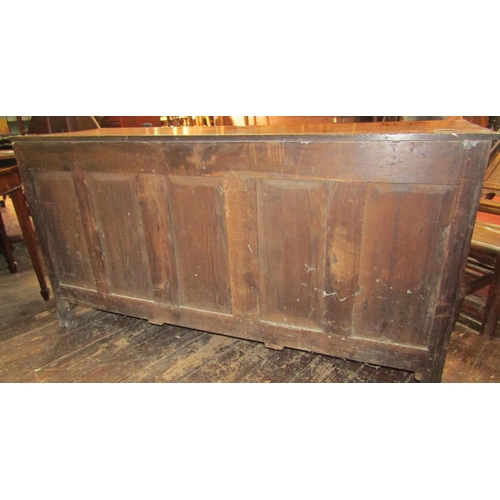 2193 - A Georgian oak north country coffer or mule chest with rising lid, the front arrangement enclosed by... 