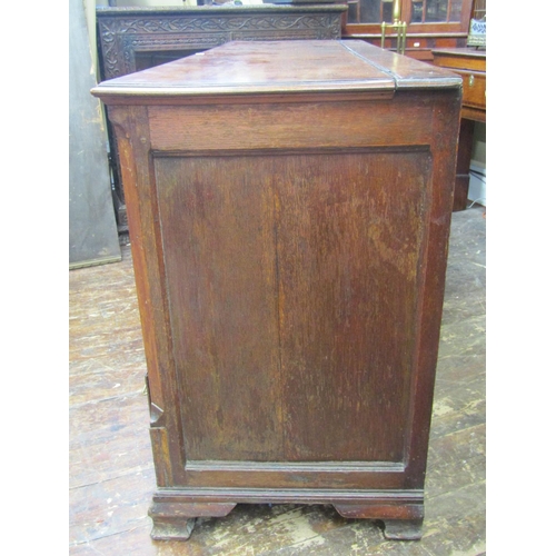 2193 - A Georgian oak north country coffer or mule chest with rising lid, the front arrangement enclosed by... 