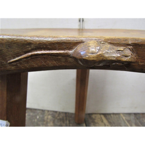 2196 - A Thompson of Kilburn Mouseman stool, raised on three simple tapering supports