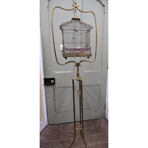2198 - A good Victorian brass bird cage with wire work panels, set upon a brass framework of full height, w... 