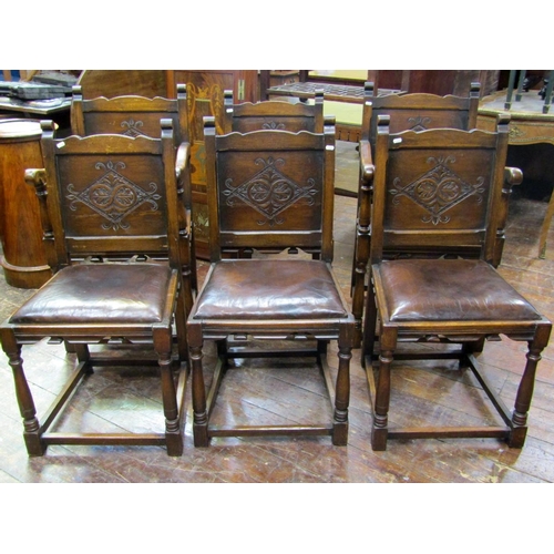 2138 - Six (4+2) oak frame dining chairs, in the Old English manner, with turned supports, hide upholstered... 