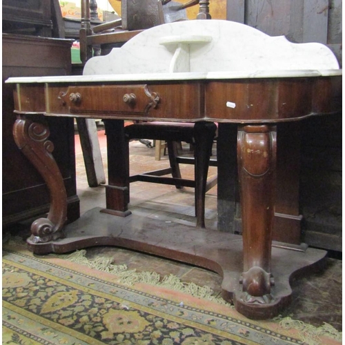 2105 - A Victorian mahogany dressing table with matching marble top wash stand, the dressing table supporti... 