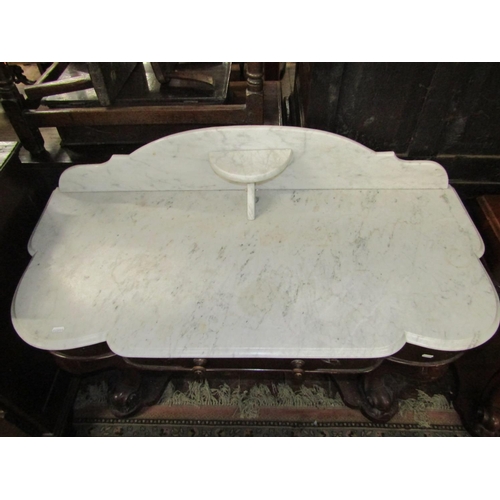 2105 - A Victorian mahogany dressing table with matching marble top wash stand, the dressing table supporti... 