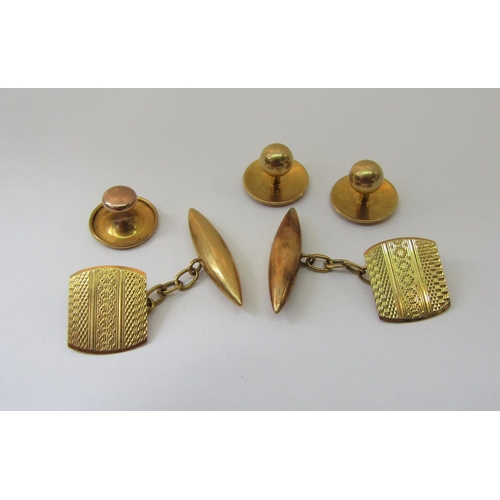 872 - Pair of 18ct cufflinks together with a pair of 18ct dress studs and a further 9ct example, (8g 18ct,... 