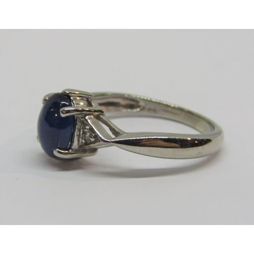 934 - 9ct white gold cabochon sapphire and diamond ring, size N, 3.4g