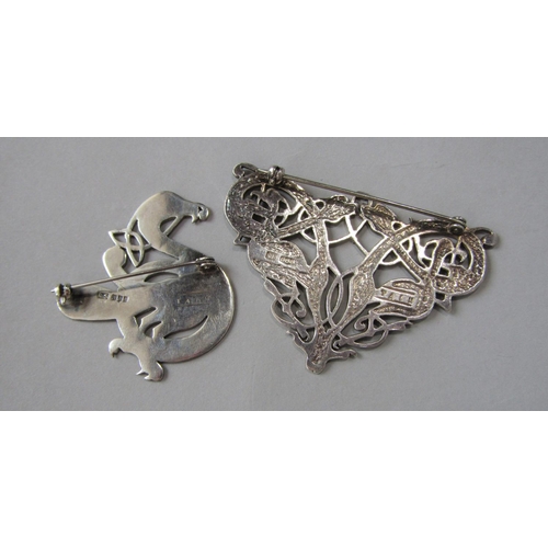 978 - Silver jewellery comprising two late 20th century Tain Silver Celtic style brooches by Rita Scott, a... 