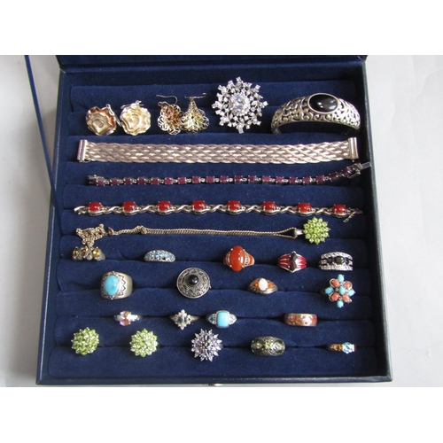 982 - Collection of contemporary silver jewellery comprising eighteen gem set dress rings of varying desig... 