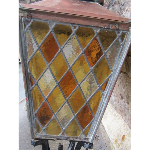 1684 - A Victorian street lantern the copper square tapered hood with raised finial and enclosed by possibl... 