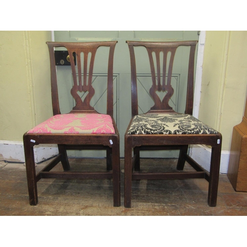 2192a - A pair of Georgian mahogany dining chairs with pierced splats, over drop-in upholstered pad seats, r... 