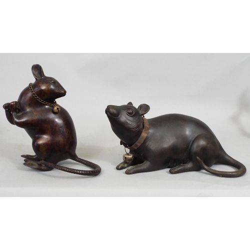 105 - A collection of five oriental bronzes, one of a rat upon a fruit, another of rats scrabbling around ... 