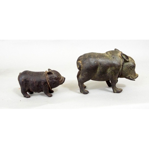 109 - A late 19th century cast spelter model of a wild boar, with two small bronze pigs