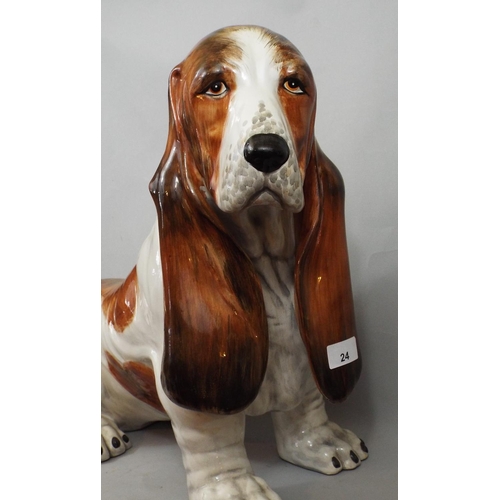 24 - Pottery figure of a basset hound, 43 cm in height