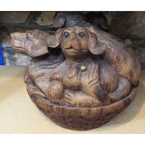 41 - Solid carved hardwood group, five puppies in a basket, 40 cm in height