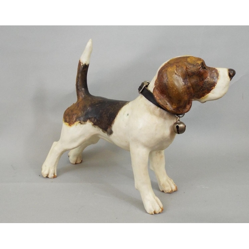 50 - A studio pottery figure of a basset hound, standing with tail erect, 24cm high