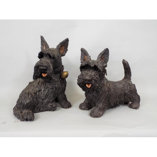 69 - Two studio pottery figures of Scots Terriers by Joanna Cooke, and four further Scots Terriers in cer... 