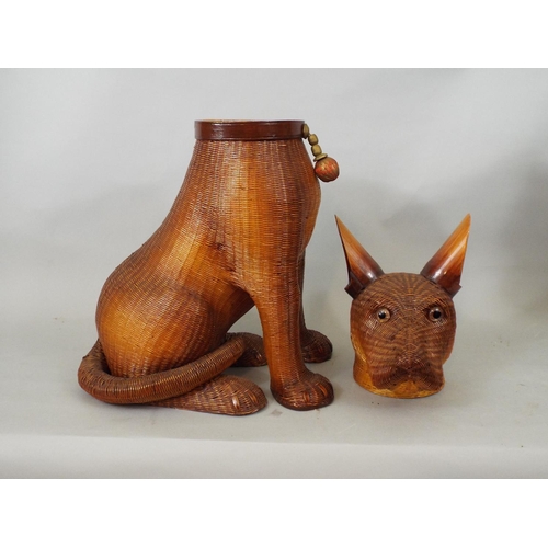 83 - A collection of five dogs including an Italian pottery figure of a Pomeranian, Scottie Dog, etc, to ... 