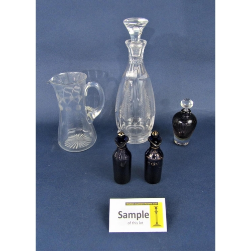 1153 - A mixed collection of glassware comprising three pairs of decanters, further decanter, pair of cup a... 