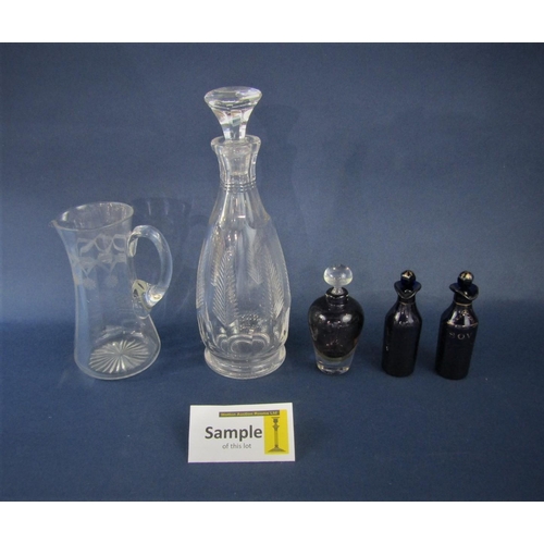 1153 - A mixed collection of glassware comprising three pairs of decanters, further decanter, pair of cup a... 