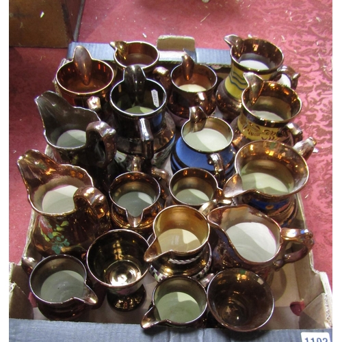 1102 - A quantity of 19th century and later ceramics including a number of copper lustre jugs of various si... 