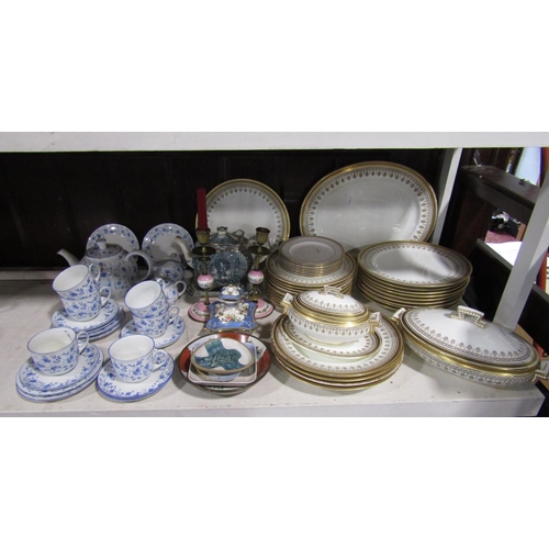 1117 - A collection of Cauldon China dinnerwares with gilt border decoration comprising oval meat plate, tu... 