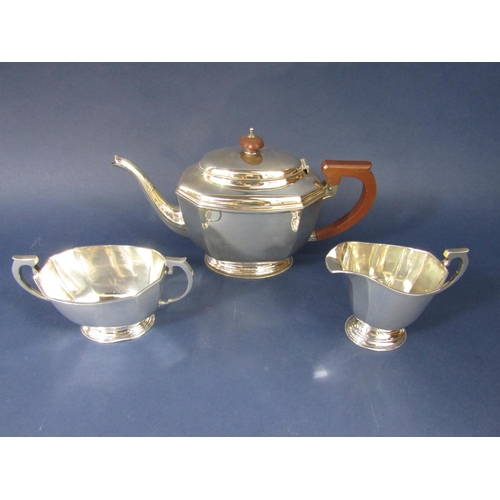 1264 - 1930's Georgian style silver octagonal boat shaped tea service, comprising teapot, milk jug and sucr... 